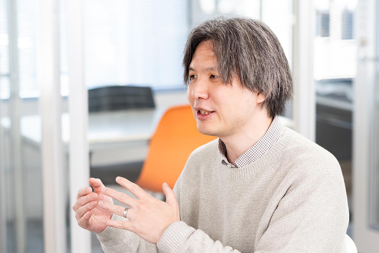 画像: 日立製作所 研究開発グループでAIを活用したロボットの研究開発に取り組む木村宣隆