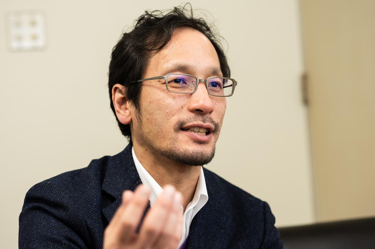 画像: 日立製作所 研究開発グループで、AIを活用した合成バイオの研究開発に取り組む伊藤潔人