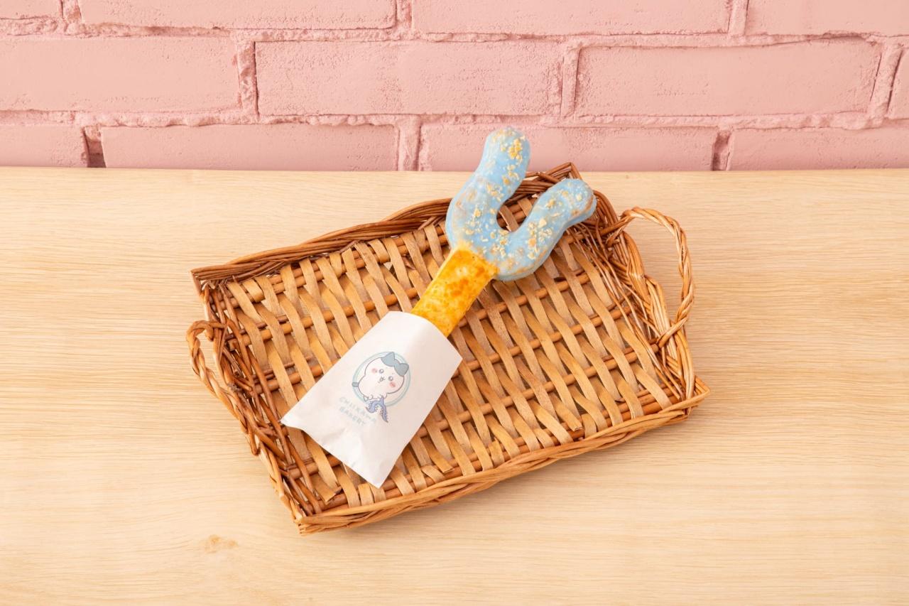 画像: 「さすまたスティックパイ（ハチワレ）」ヤーッ!! シュガーに包まれたハチワレの甘いさすまたスティックパイ ©nagano