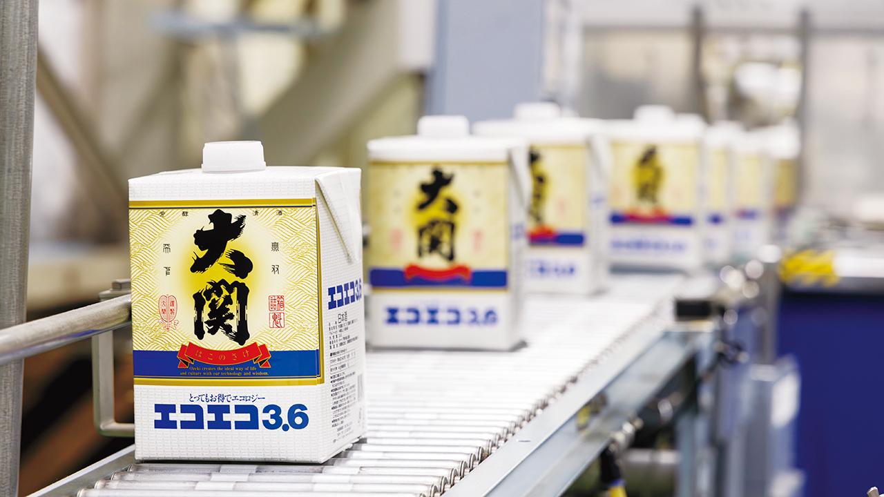 画像: パック詰め商品の天面への印字工程