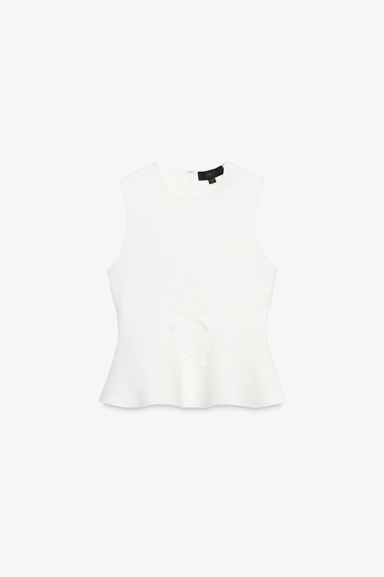 新品未使用タグ付き ZARA エンボス加工ぺプラムトップス - メルカリ