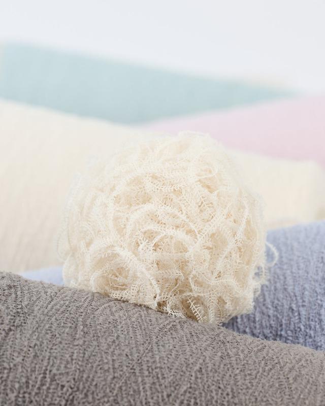 画像: 1本1本の糸にも温かさの秘密がある