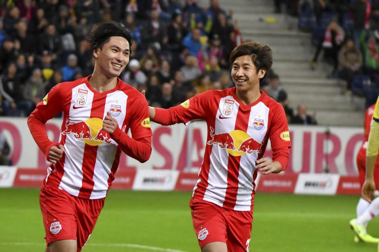 画像: 南野拓実と奥川雅也 (C)Getty Images