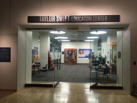 EXCLUSIVE: Taylor Swift beams as she poses with fans at the 'Taylor Swift Education Center' in Nashville, Tennessee.